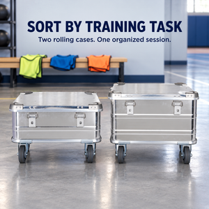 BORY 2-Piece Aluminum Rolling Storage Box Set for Club Training Gear in its intended setting; two empty silver cases with a caster base on each