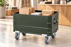 Green rolling storage bin with paper bags and sample boxes beside a pop-up display; props not included