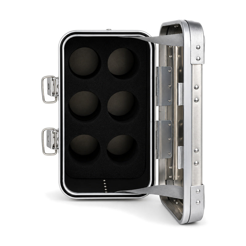 Six bottle compartments in the removable foam insert fitted inside the silver wine case