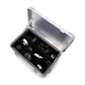 Interior layout reference: silver case with padded divider insert; cameras and lenses not included
