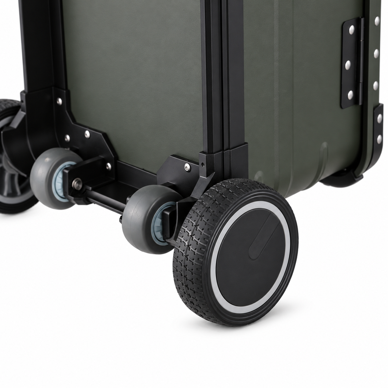 Close-up of green case 5-inch wheel, tread, axle mounting and supporting wheel assembly