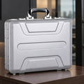 BORY 4350 silver aluminum briefcase standing on an office desk in an AI-created business setting