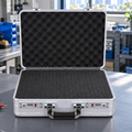 BORY 4380 aluminum equipment case with foam on an AI-created technical workbench; instruments not included